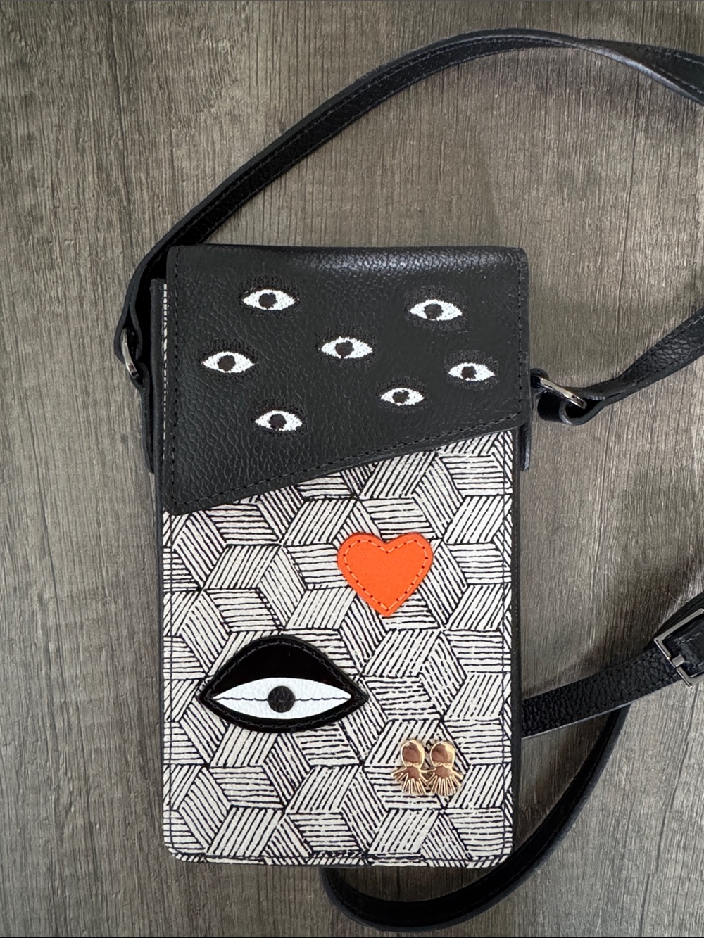 Min & Mon Black and White Eye-Pattern Crossbody Phone Bag with Orange Heart